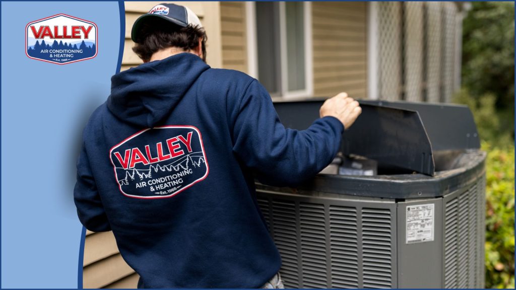 A valley air HVAC technician servicing an AC condenser unit